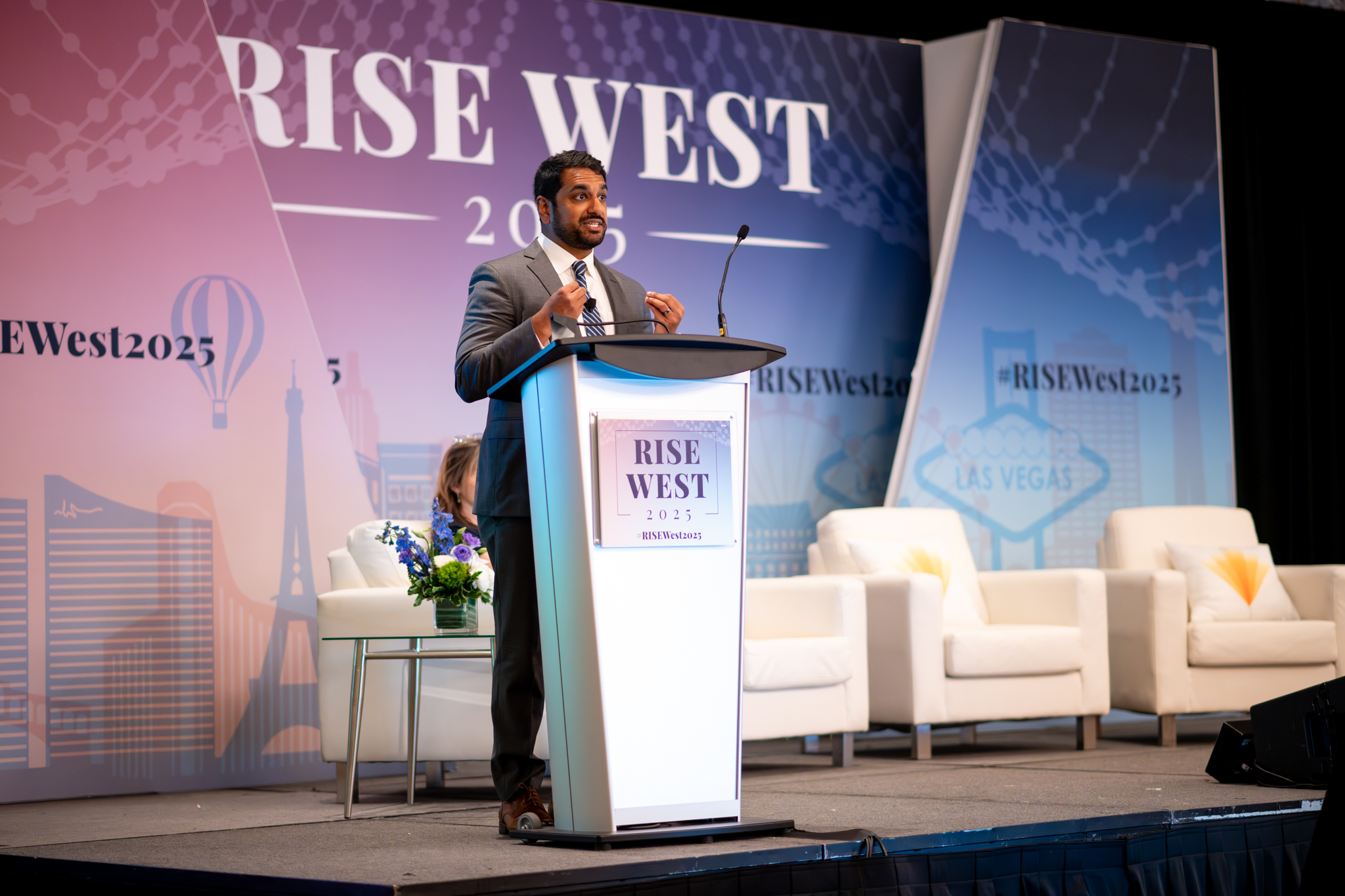 Neil Patil speaking on the main stage at RISE West 2025